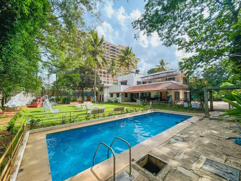 Private outdoor swimming pool at a Spacez luxury villa in Bengaluru for relaxing stays