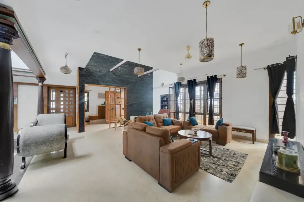 Comfortable indoor lounge area at a Spacez villa in Bengaluru for relaxed gatherings