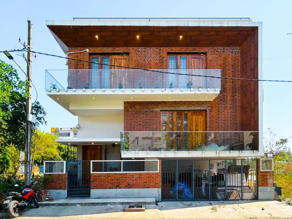 Grand heritage-style villa exterior of Aurora Heights Spacez in JP Nagar featuring a stately facade and manicured gardens