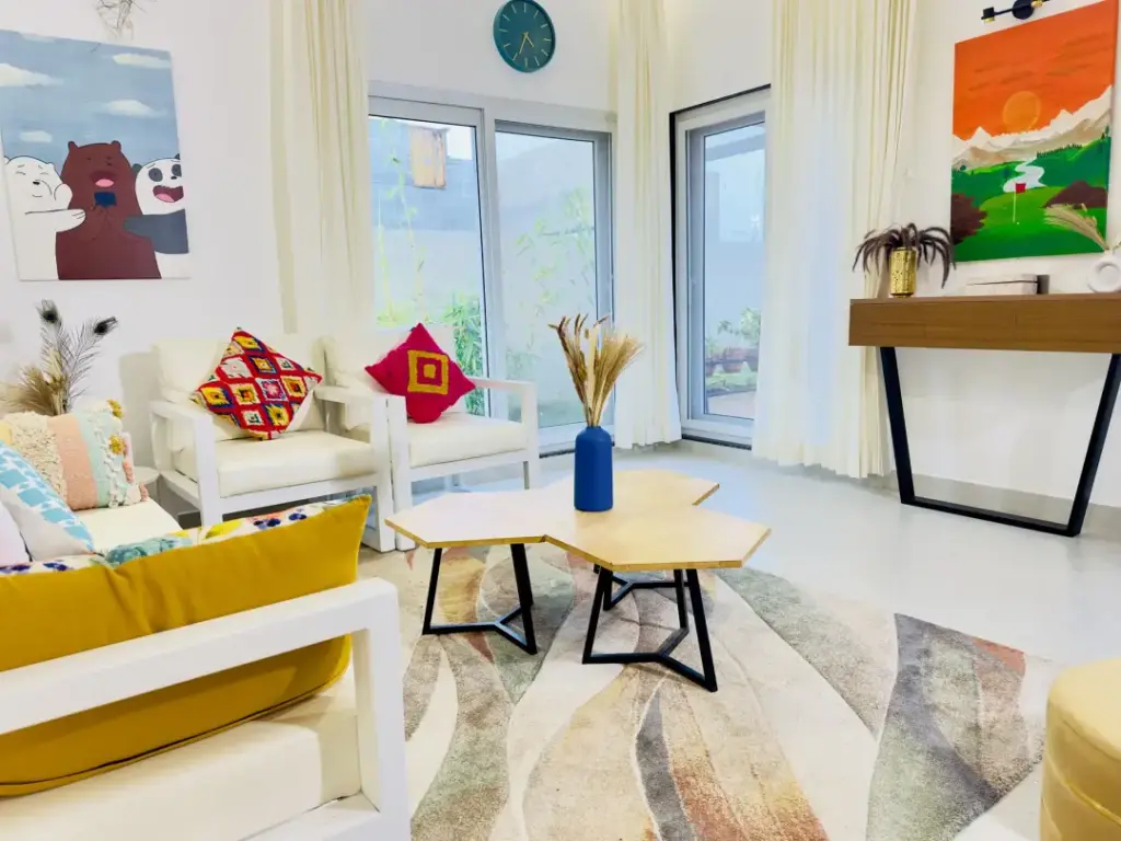 Sophisticated and open-plan luxury lounge at Soul Club, designed with earthy tones and premium furniture for an intimate evening conversation.