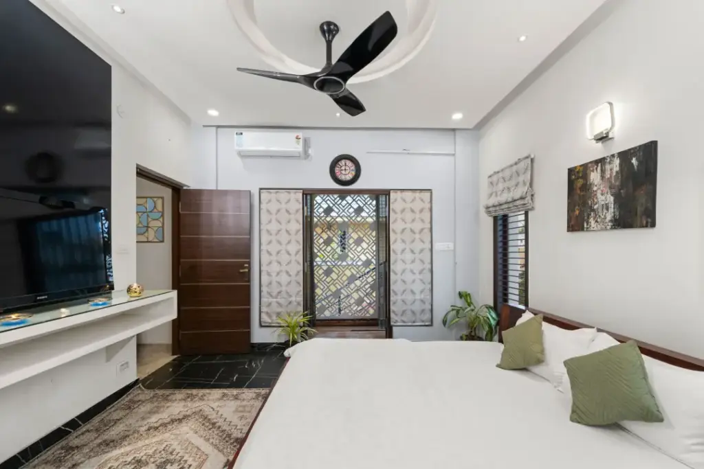 Luxury 3BHK villa bedroom at Twilight Terrace Spacez with premium linens and modern interior design for group stays