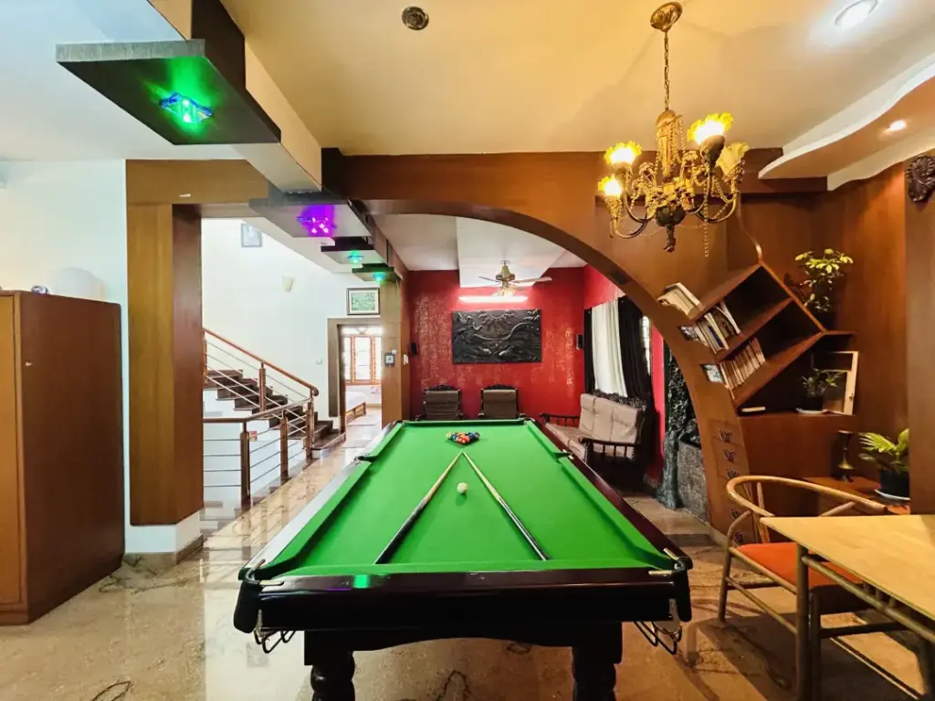 Exclusive designer sneaker display and entertainment room at Mansion Bay Spacez for trendy social gatherings and fun staycations