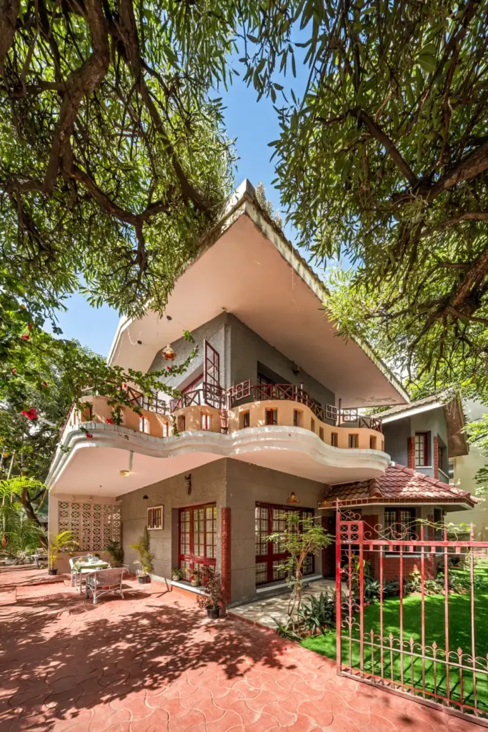 The timeless, red-brick exterior of Heritage Haven in Koramangala, showcasing classic Bangalore architecture with a modern luxury touch.