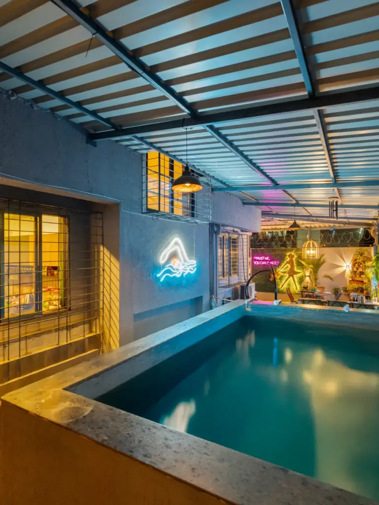 Hilltop Hideaway Goregaon Mumbai private garden and pool in monsoon season