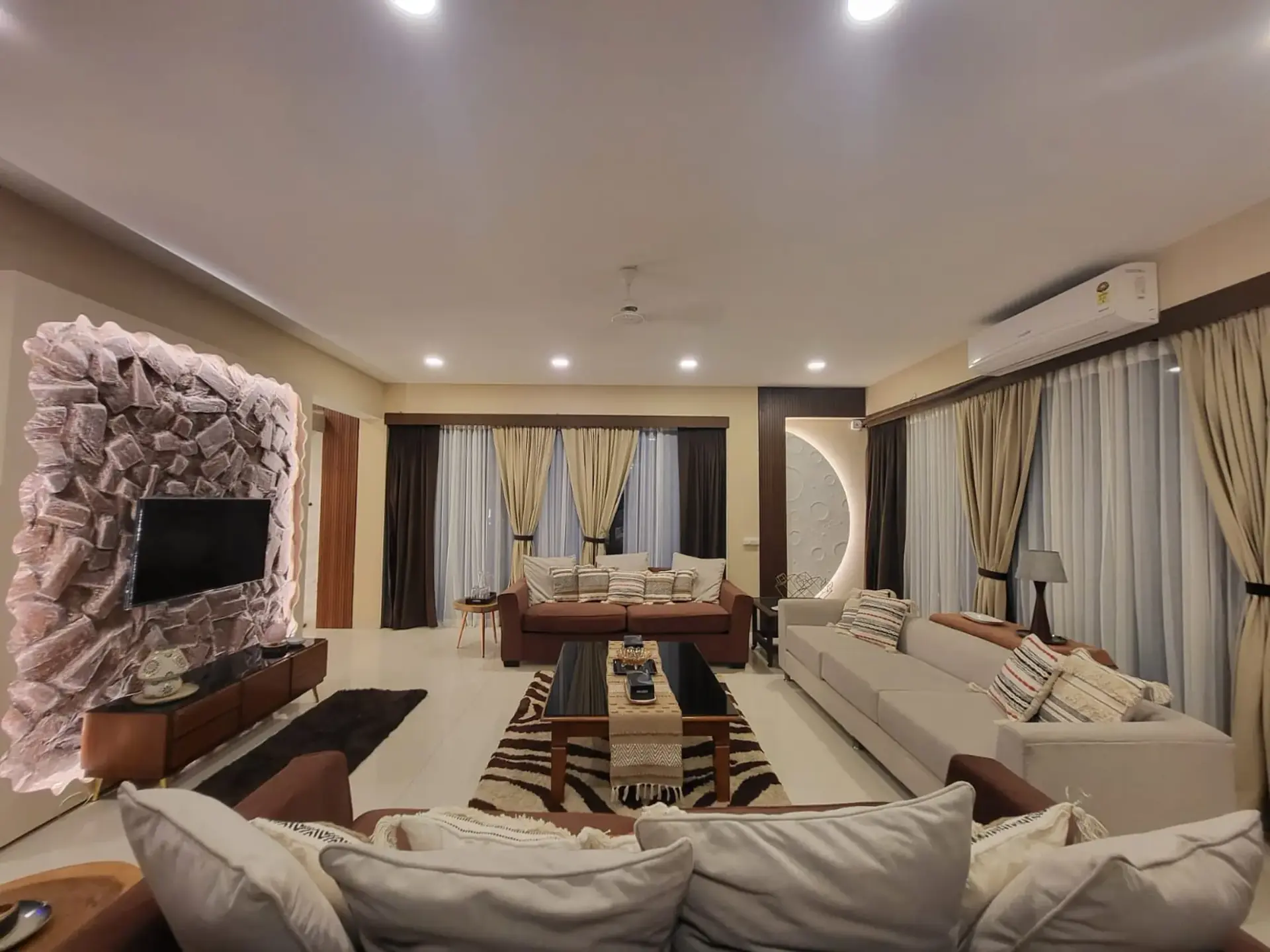 Whispering Stones Goregaon — private villa with modern moon theme bed